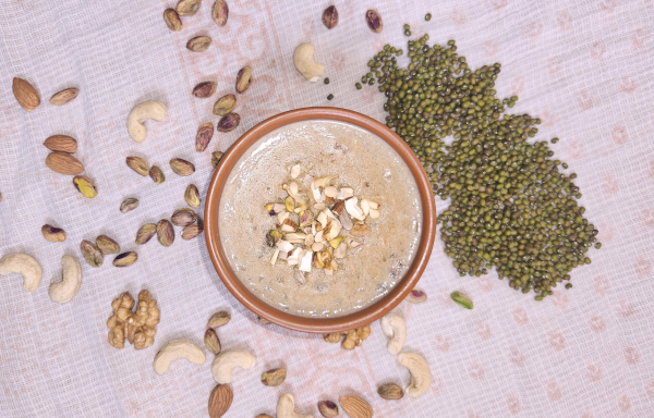 Baby enjoying RagiNuts meal